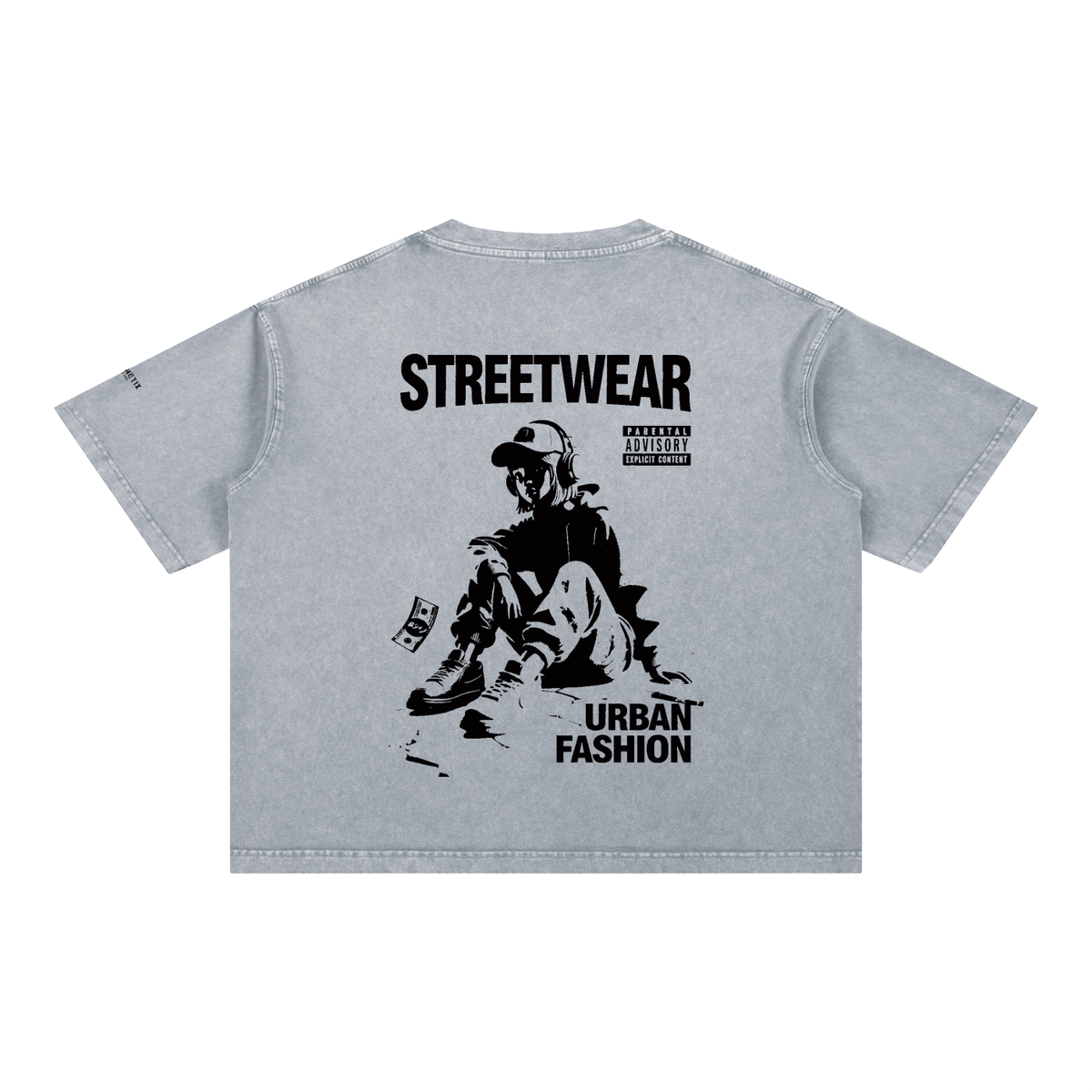 A light gray short-sleeve t-shirt shown from the back, featuring a large black graphic print of a person sitting with a bag and the text 'STREETWEAR' and 'URBAN FASHION' on a white background.