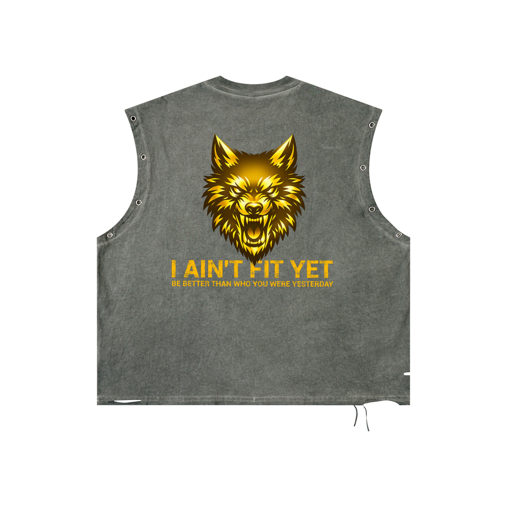 A sleeveless cropped tank top in washed dark gray, featuring a large metallic gold wolf graphic on the back with the text 'I AIN'T FIT YET' and a smaller tagline underneath.