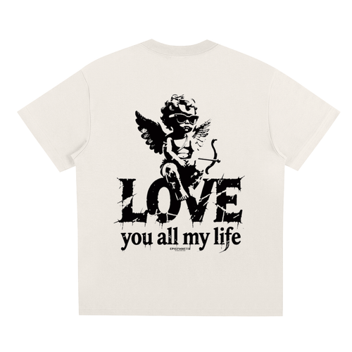 An off-white short-sleeve t-shirt with a black graphic print on the front showing a cherub holding a bow and arrow above the distressed text 'LOVE you all my life'.