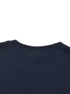 Close-up of a navy blue t-shirt collar on a white background